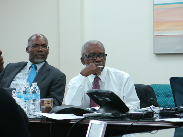 Pedro Williams, left, the GERS board attorney, and Chairman Vincent Liger discuss issues at Wednesday's meeting.