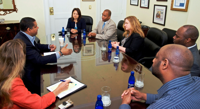 Gov. John deJongh Jr. meets with BTOP officials Friday at Government House.