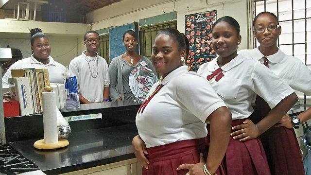 In the Central High kitchen, front from left, Richelle Allen, Shani Cook, Kniqua Christian, and back from left, Kieshele Winston, Brendan James and teacher Camisha Lynch.