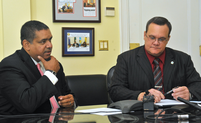 Gov. John deJongh Jr. and acting Police Commissioner Rodney Querrard at Tuesday press conference. (Government House photo)