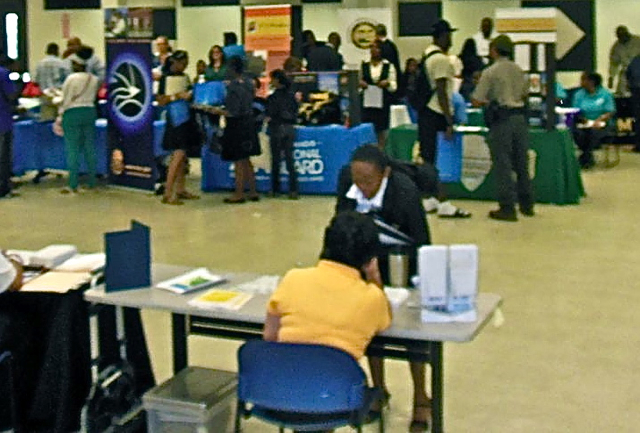 Interested job seekers visit the UVI Career Day Tuesday.