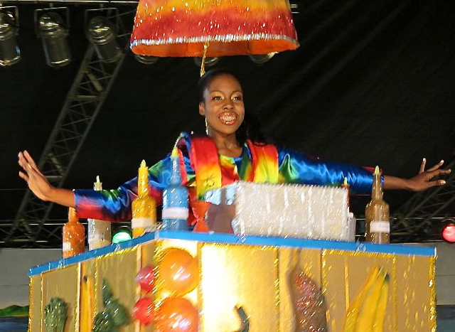 Adisha Penn honors her Uncle Rudy with a rainbow fraco costume. Penn went home with the crown and the title of 2013 Carnival Queen.