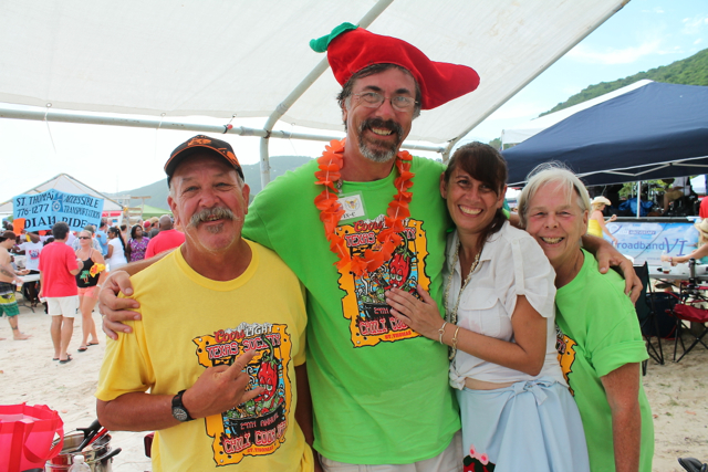 From left, CASI category champion Ron Baker, Chili Cook-off organizer Erik Ackerson and a pair of cook-off volunteers.