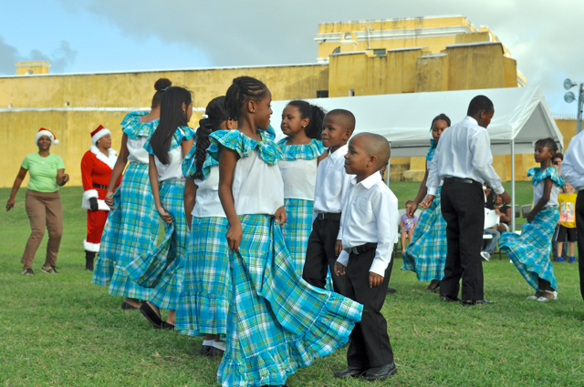 The St. Mary’s School Quadrille Ensemble entertains before Santa Claus takes the bandstand.