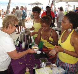 Yandie Daniels (from left, in yellow), Sana Joseph and Keba Daniels with their wholesome, delicious yellow squash soup with spinach and ground nuts.