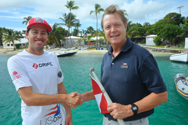 Taylor Canfield, left, is congratulated by Phillip Shannon, president of the Virgin Islands Sailing Association, for being named V.I. Sailor of the Year.