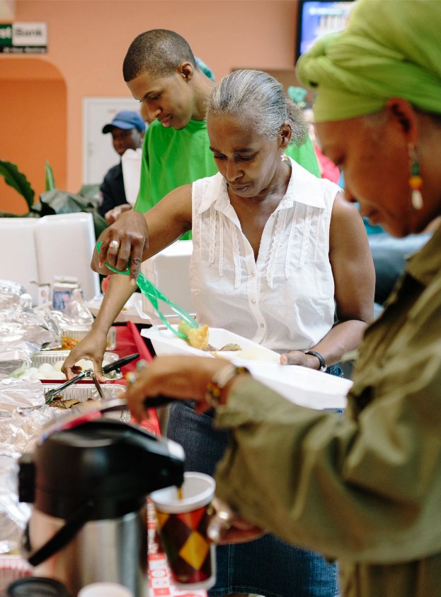 Hospital staff enjoy a Crucian breakfast provided by Democrats and Molina Medicaid Solutions on Christmas.