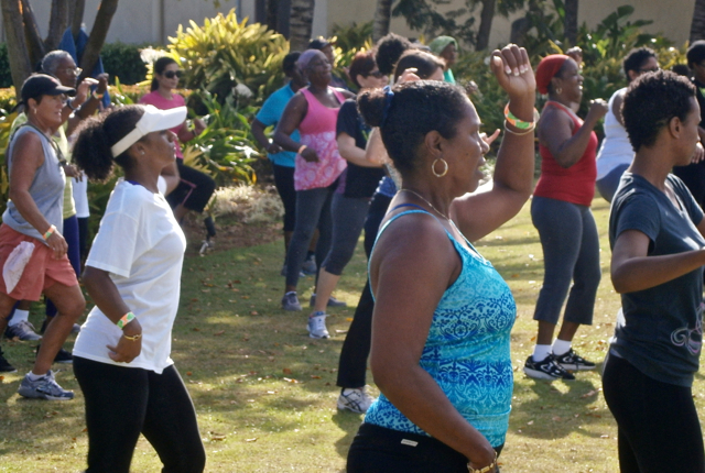 First-time Zumba dancer Daphne Harley joins the spirited crowd for 'Zumbathon.'