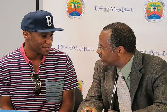 Award-winning filmmaker M.K. Asante and Dr. Benjamin Carson Sr. share a moment during a press conference held during Monday's "Man Up Conference."