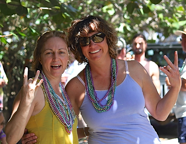 Donna Pavina, left, and Elizabeth Harding wear their freshly caught beads.