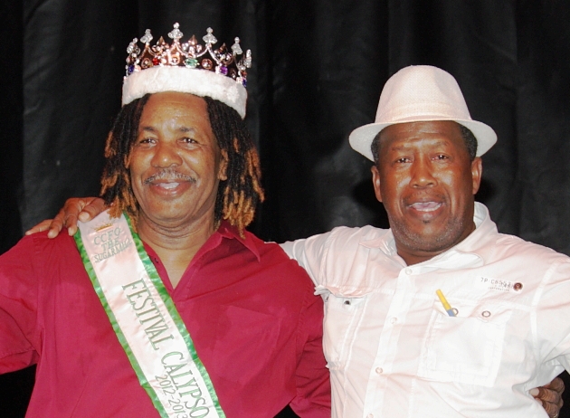 Cerdric Vandyke "Spade" Brookes accepts his calypso crown from emcee Tommy Joseph.