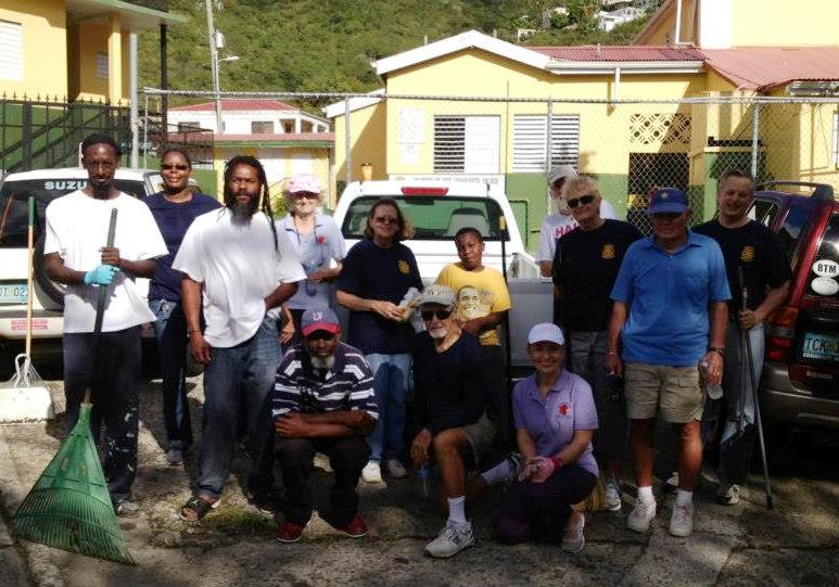 Members of the Rotary Club of St. Thomas Sunrise join Savan area neighbors to clean the Jane E. Tuitt school grounds (photo courtesy of Diana Parker).