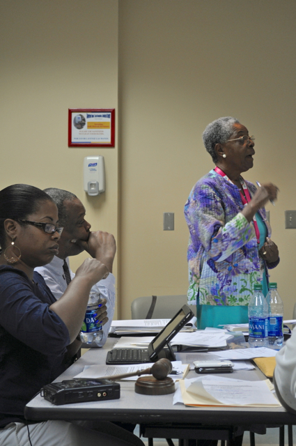 JFL board member Joyce Heyliger makes her case for a proposed nursing pay raise while Chairman Kye Walker and new Vice Chairman Dr. Anthony Ricketts listen.