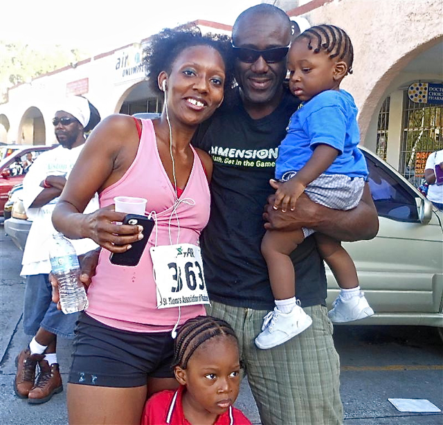 Tonia Stapleton with her cheering section, husband Clinton and sons Aden and Ajoni.