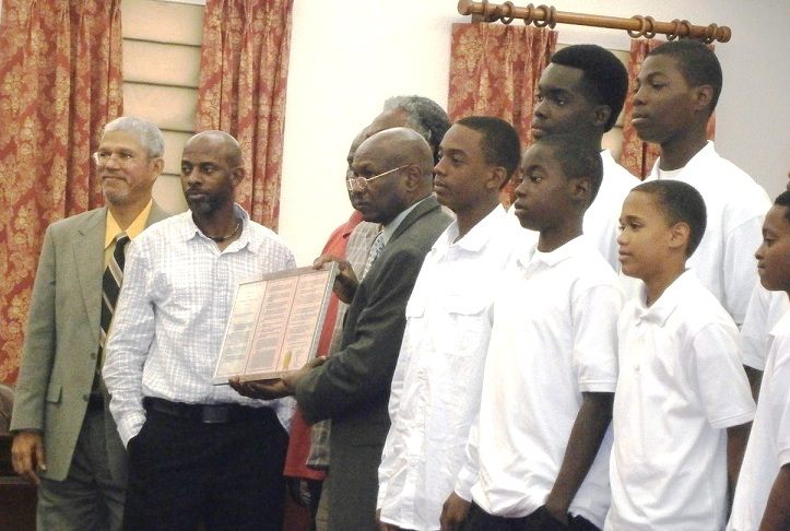 The Elrod Hendriks West 11-12 Little League All Stars are presented with framed resolution (Erik Ackerson photo).