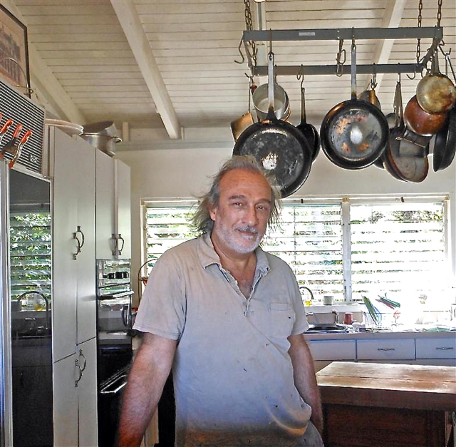 Romano shows off his home kitchen.