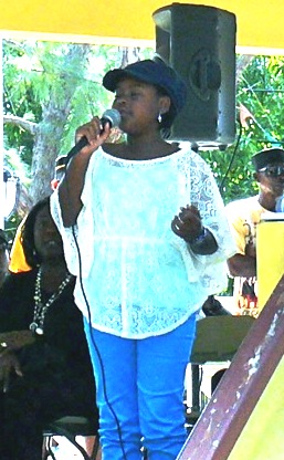 Brianna Campbell, 10, wowed the crowd with soulful singing during the ceremony in Buddhoe Park after the parade in Frederiksted.