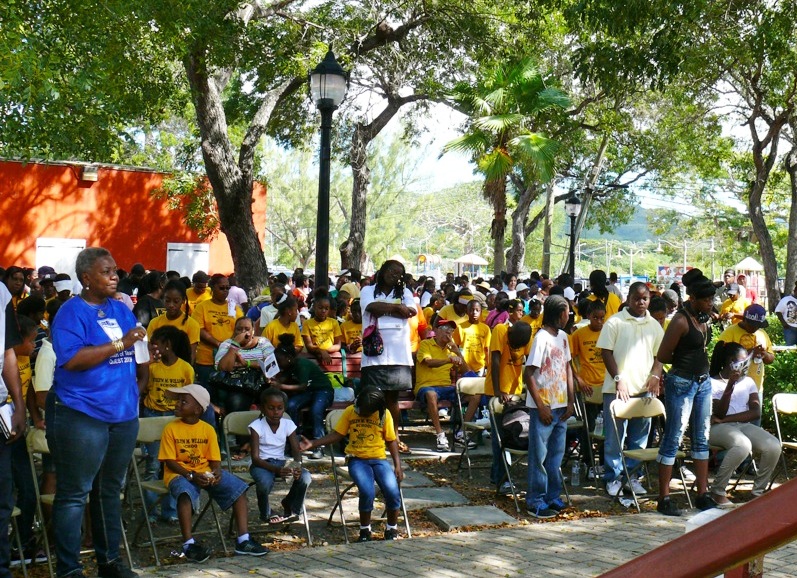 The crowd in Buddhoe Park Monday commemorating the birthday of Martin Luther King Jr.
