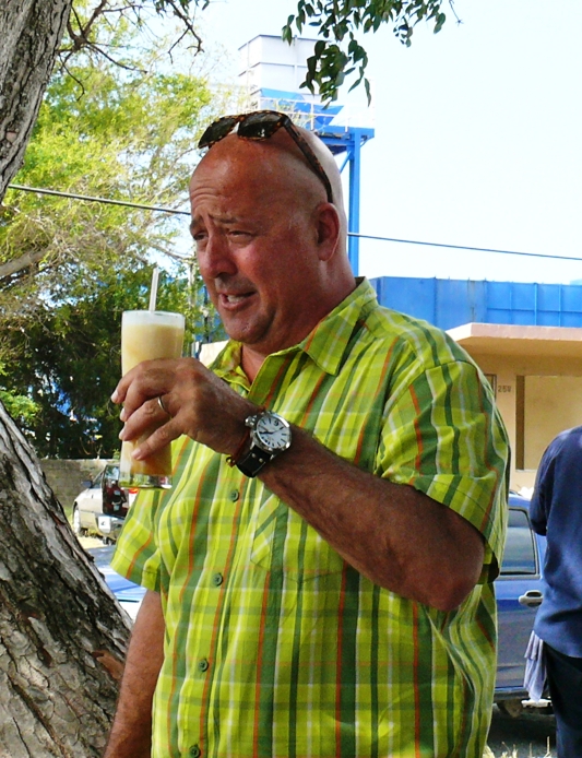 Bizarre Foods America host Andrew Zimmern with a healthful local drink combo of soursop, peanut punch, sea moss, oatmeal and pumpkin (Bill Kossler photo).