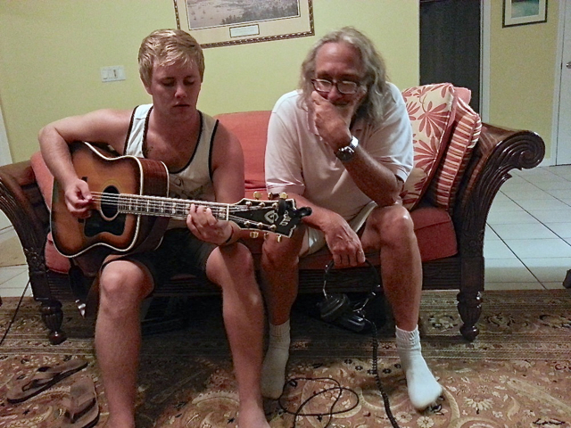 Keith Smith, left, plays his song 'Serious Girl' for mentor Sean Finnigan.