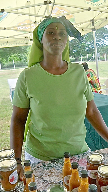 Violet Drew, of Ras Sonrise & Daughter Stand Farm, said she sold out of her plantain chips right away. She also had mango and plantain fruit leather. She didn't waste a thing in her melon peel pickles, and her candied lime peels looked tempting. 