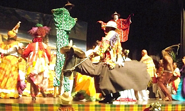 In the finale, a donkey joins mocko jumbies and a stageful of dancers.