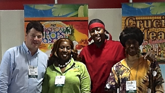 From left, Andrew Clutz, Carolyn Isaacs, Taj Siwatu and June Archibald at the V.I. trade booth in Brazil.