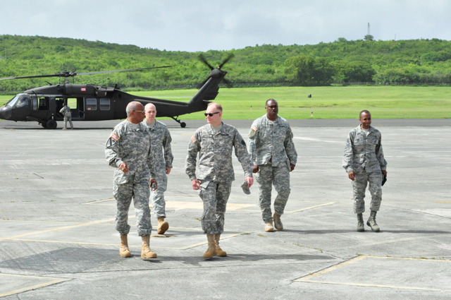Maj. Gen. Renaldo Rivera, adjutant general of the Virgin Islands, left, and Maj. Gen. Gerald Ketchum, director of domestic operations and force development, National Guard Bureau, center, return to St. Croix from an aerial tour of the U.S. Virgin Islands Territory Wednesday. (Photo provided by 2nd Lt. Kirk Rojas).