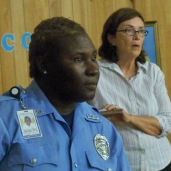 VIPD Officer Gail Liburd (left) and organizer Mary Dema discuss ways to turn the town around.