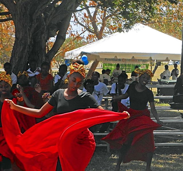 Wesley Methodist Chuch dancers are a swirl in red.