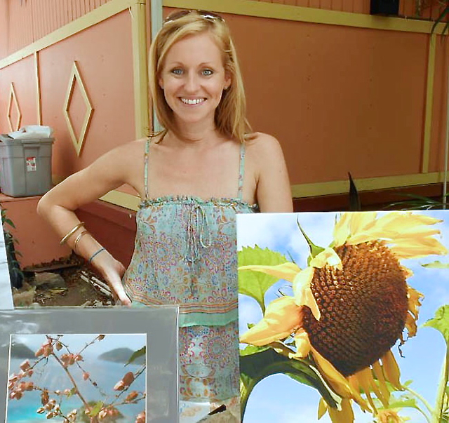 Photographer Jessica Howard displays her work at the 33rd annual Art in the Garden.