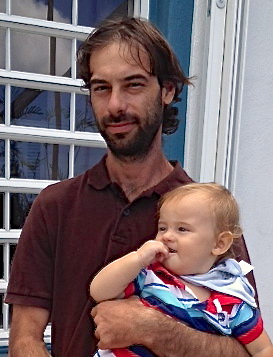 David Voss, originally from Chicago and now a St. Thomas resident, and his son Leon spent Sunday morning at Our Lady of Perpetual Help Church.