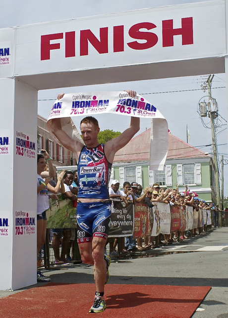 Richie Cunningham crosses the finish line first in the men’s race.