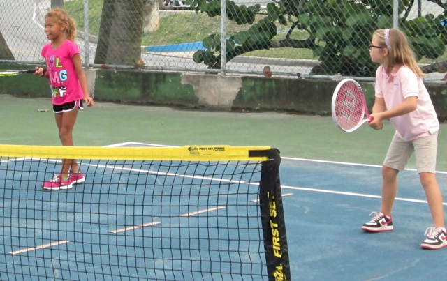 Ciena Clendinen and Winnie Majette learn the game.