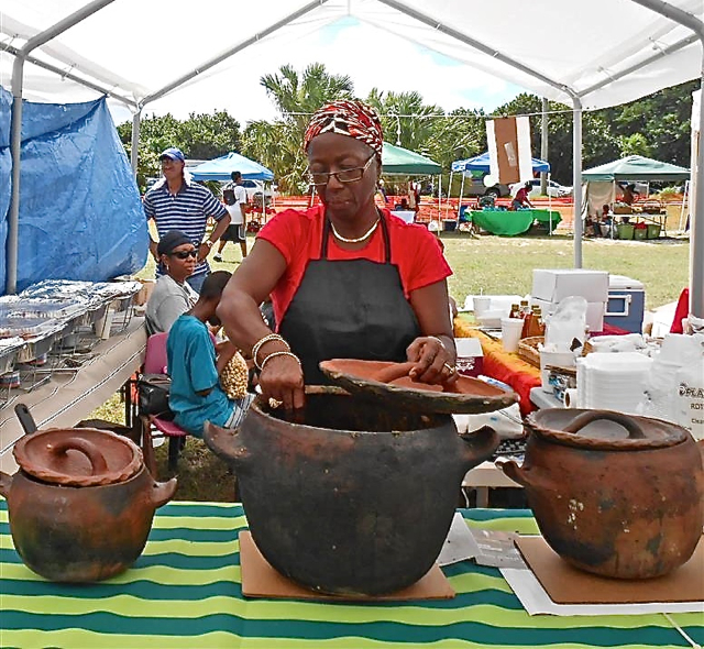 Patrice Scabriel cooks up platters of vegetarian delights at the 30th Agriculture and Food Fair.