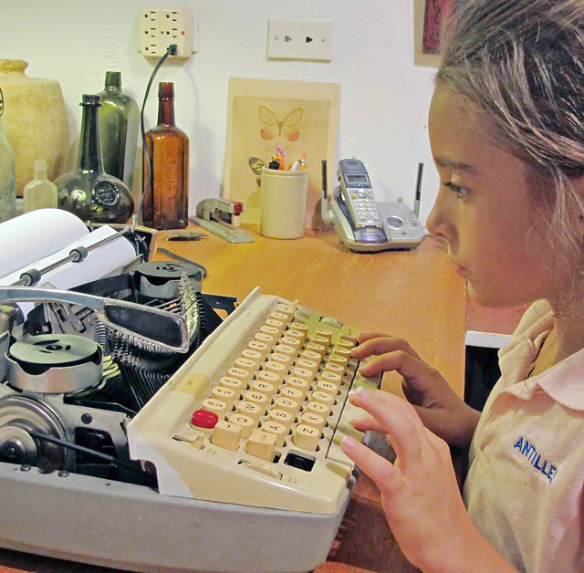 Portia at the typewriter.