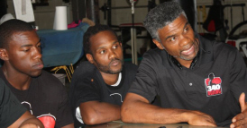 Julius Jackson (from left), Samuel Rogers and trainer Julian "The Hawk" Jackson.