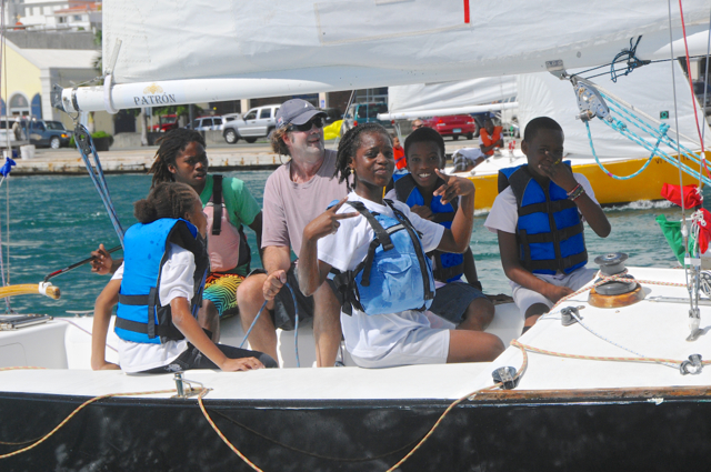 Dave Perry sails with students in the Carlos Aguilar Youth Regatta. (Dean Barnes photo)