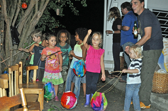 Pre-school strudents carry their handmade lanterns in the Stone House School Martinmas celebration Friday.