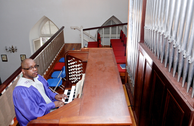 Alvin Milligan, Millenium Choir director, at the organ. (Photo provided by A. Milligan)