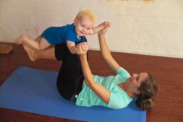 Laura Croney and her son Oliver, 13 months old, enjoy yoga together.