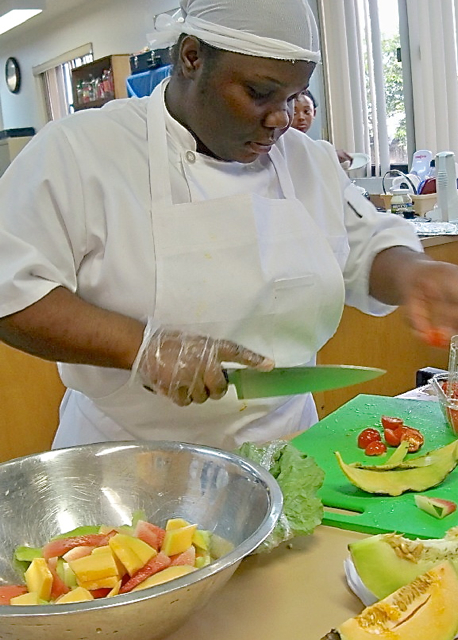 Rachelle Jean Baptist gets melons ready for the Super Chef Competition.