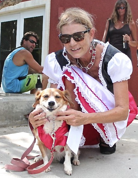 Tisha and her owner Cindie Kennedy wore matching Red Riding Hood costumes to win first place in the pet/owner combo category.