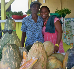 Youlanda Lee-Clendenen (left) and Andrea Montoute selling pumpkins. 