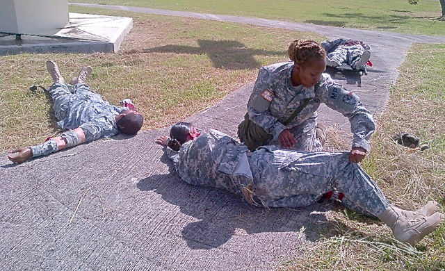 Sgt. Khadija Francois of 661st Military Police Detachment conducts casualty assessments at the collection point during the MASCAL exercise. (Photo provided by the V.I. National Guard)