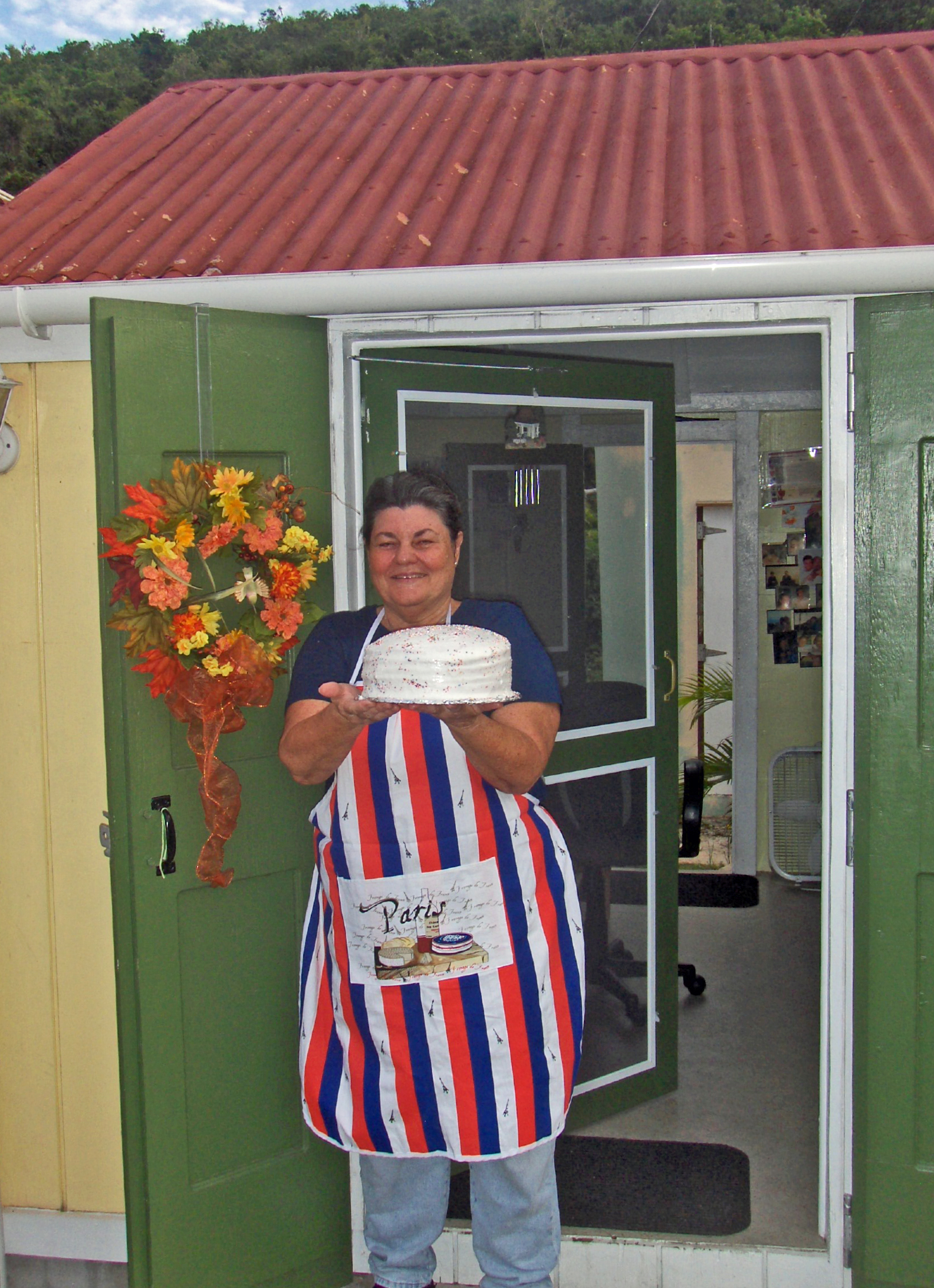 Juliana's Bake Shop owner Linda Greaux displays a cake that would make "mama" proud.