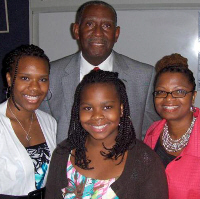 UVI President David Hall with (left to rigiht) daughters Sakile and Kiamsha and wife, Marilyn Brathwaite-Hall.