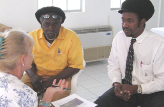 From left, Coral Bay Community Council President Sharon Coldren, the Agriculture Department's Director of Agriculture Development Ashley George and Agriculture Commissioner Louis Petersen Jr.