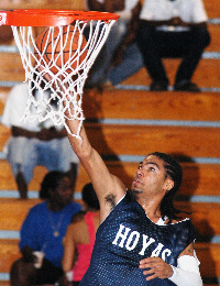 Hoyas point guard Roman Castillo goes in for an uncontested layup. 