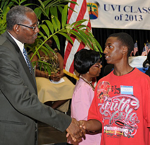 Dante Morton (right) is welcomed by UVI President David Hall. (UVI Public Relations Office photo)